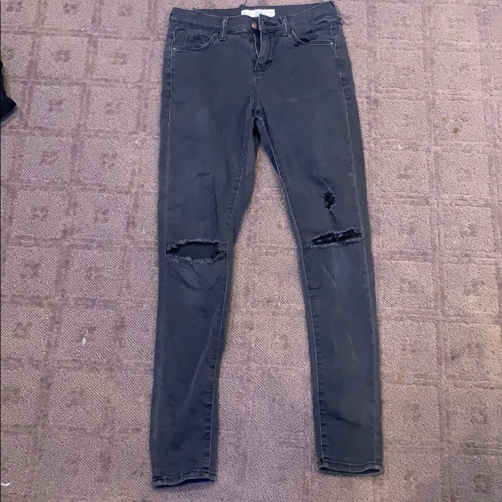 grey ripped jeans